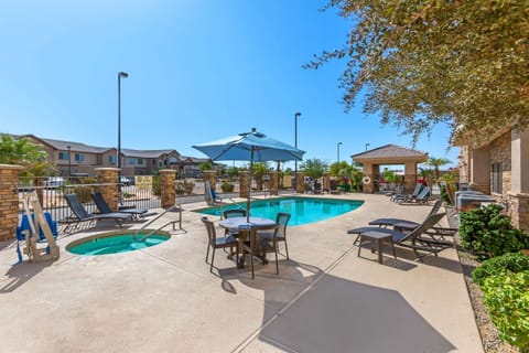 Outdoor pool, pool umbrellas, sun loungers