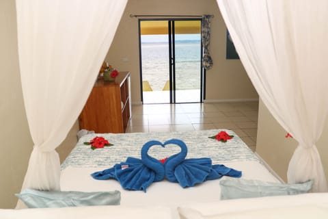 Panoramic Bungalow, 1 Bedroom, Oceanfront | Minibar, in-room safe, free WiFi, bed sheets