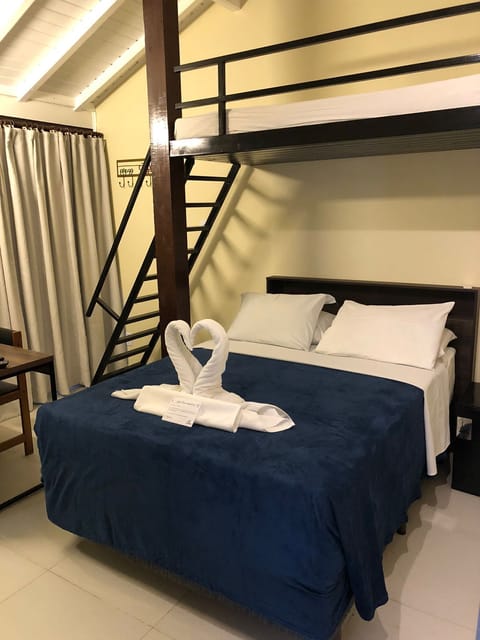 Family Triple Room | Minibar, free WiFi, bed sheets