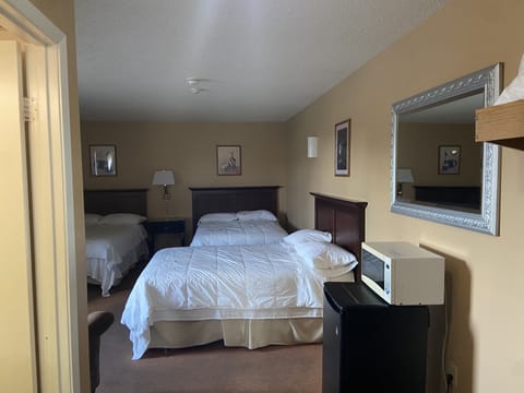 Family Room, 3 Double Beds with 1 Sofa Bed | In-room safe, iron/ironing board, free WiFi, alarm clocks