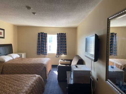 Two Queen Beds with Sofa Bed | In-room safe, iron/ironing board, free WiFi, alarm clocks