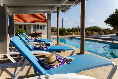 Outdoor pool, pool umbrellas, sun loungers