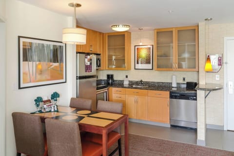 Suite, 1 Double Bed | Private kitchen | Fridge, microwave, stovetop, dishwasher