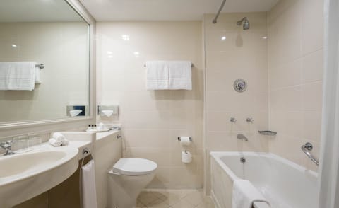 Combined shower/tub, designer toiletries, hair dryer, bathrobes