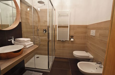 Triple Room, Balcony, Mountain View | Bathroom | Shower, bidet, soap, shampoo