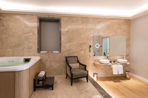 Presidential Suite, Hot Tub, City View | Bathroom | Rainfall showerhead, designer toiletries, hair dryer, slippers