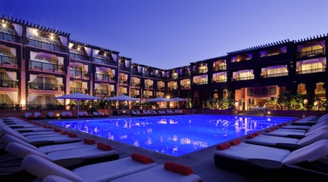 Indoor pool, outdoor pool, pool umbrellas