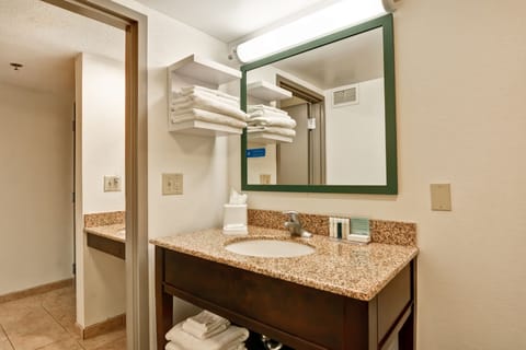 Suite, 1 King Bed, Fireplace | Bathroom | Combined shower/tub, free toiletries, hair dryer, towels