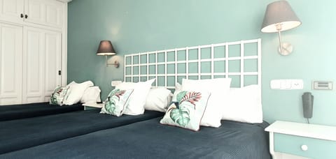 Twin Room | Blackout drapes, free WiFi, bed sheets