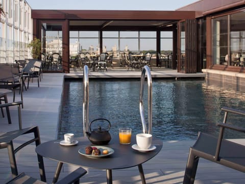 Breakfast, lunch, dinner served; Mediterranean cuisine, pool views 