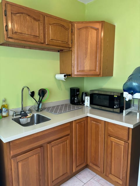 Apartment, 1 Queen Bed | Private kitchen | Fridge, microwave, oven, stovetop