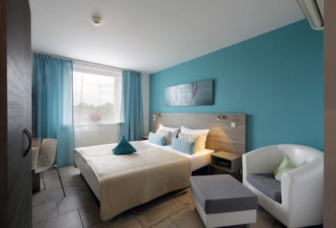 Double Room | Minibar, in-room safe, desk, cribs/infant beds