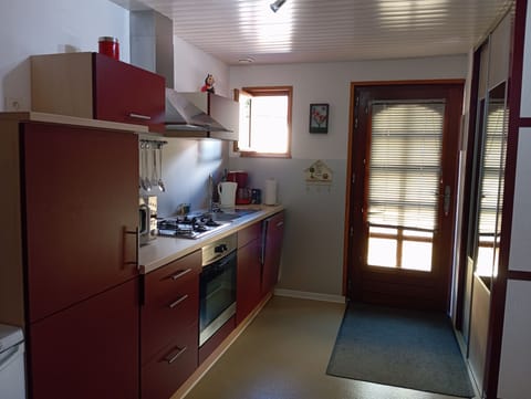 Cottage (Gîte du Grébiay) | Private kitchen | Fridge, microwave, toaster, highchair