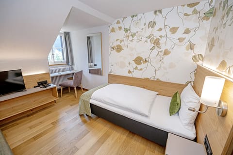 Premium bedding, minibar, in-room safe, laptop workspace