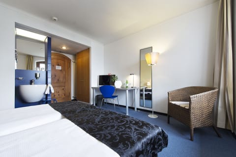 Bathtub, free toiletries, hair dryer, bathrobes