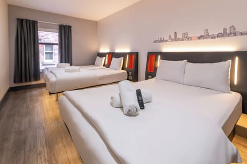 Family Quad Room With Window | Iron/ironing board, free WiFi, bed sheets