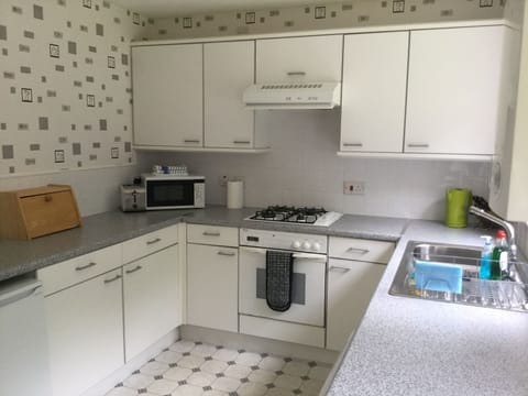 Apartment | Private kitchen | Full-size fridge, microwave, oven, stovetop