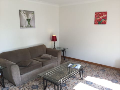 Two-Bedroom Apartment | Living room | Flat-screen TV, DVD player
