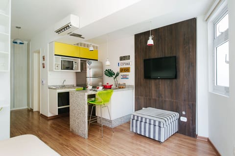 Design Studio, 1 Bedroom | Living area | Flat-screen TV