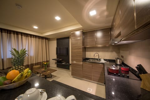 One Bedroom Suite | Living area | Flat-screen TV