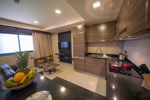 One Bedroom Suite | Living area | Flat-screen TV