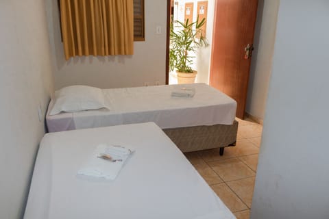 Double or Twin Room | Minibar, desk, iron/ironing board, free WiFi