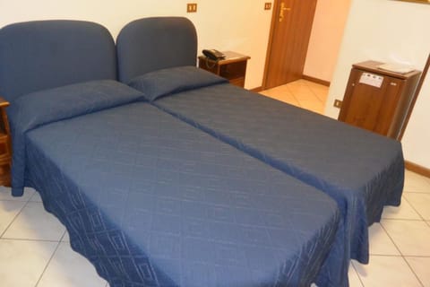 Twin Room, 2 Twin Beds | In-room safe, desk, cribs/infant beds, rollaway beds