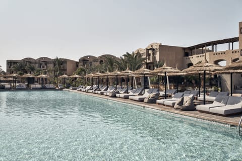 Outdoor pool, pool umbrellas, sun loungers