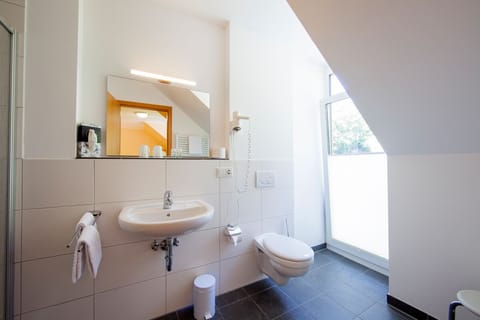 Shower, free toiletries, hair dryer, towels