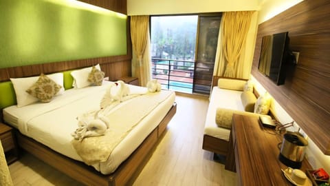 Premium Room (Pool Facing) | In-room safe, iron/ironing board, free WiFi