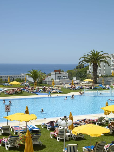 Indoor pool, seasonal outdoor pool, pool umbrellas, sun loungers