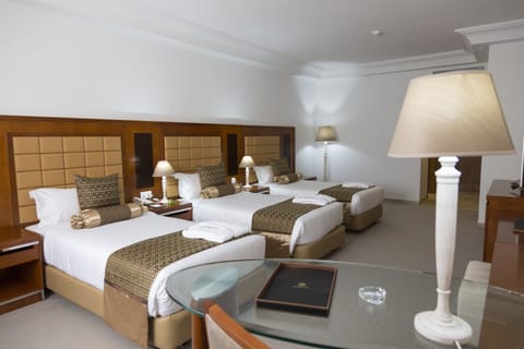 Deluxe Triple Room | 1 bedroom, minibar, in-room safe, desk