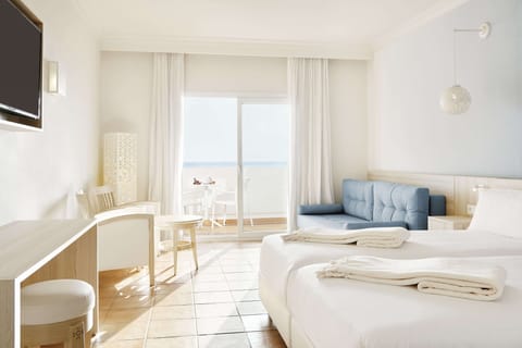 Double Room, Sea View (Beachfront) | Minibar, individually decorated, individually furnished, desk