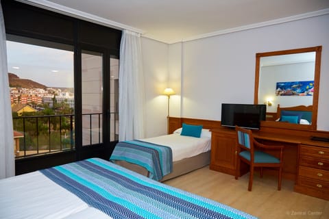 Standard Triple Room | Minibar, blackout drapes, soundproofing, free WiFi