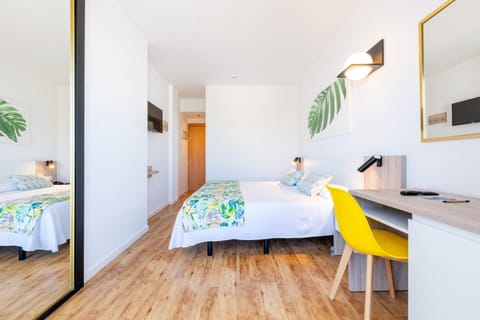 Desk, blackout drapes, free WiFi, bed sheets