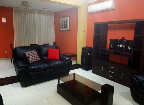 Apartment, 3 Bedrooms | Living area | Flat-screen TV