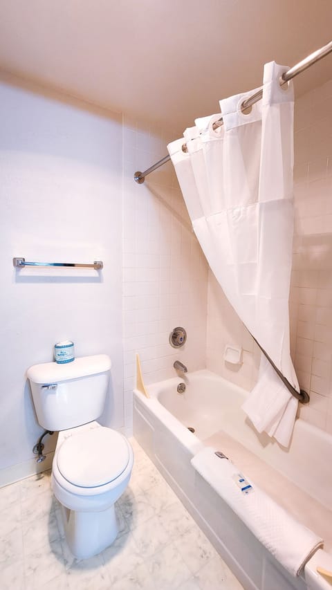 Standard Room, 2 Queen Beds, Non Smoking | Bathroom | Combined shower/tub, free toiletries, hair dryer, towels