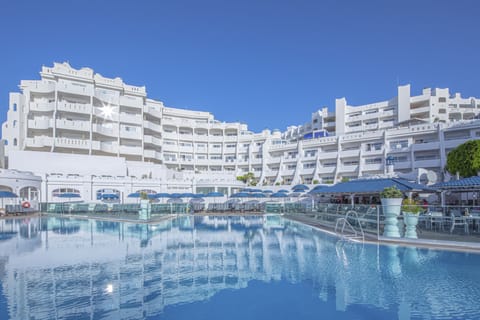 Outdoor pool, a heated pool, sun loungers