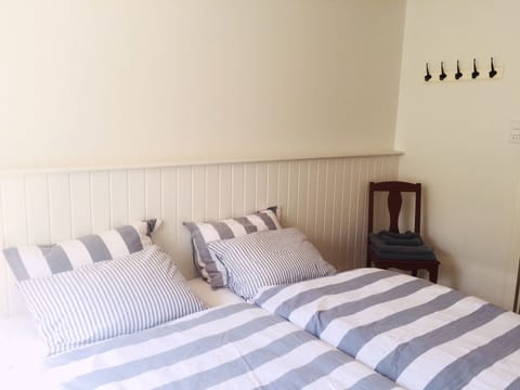 Double Room, 2 Twin Beds, Private Bathroom | Cribs/infant beds, free wired internet, bed sheets