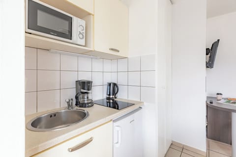 Two-Room Apartment | Private kitchen | Fridge, microwave, coffee/tea maker, highchair