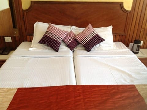 Deluxe Double Room, Hill View | Premium bedding, minibar, desk, iron/ironing board