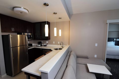 Suite, 1 Bedroom, Non Smoking | Private kitchen | Full-size fridge, microwave, stovetop, dishwasher