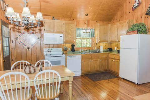 Bayberry Cottage | Private kitchen | Fridge, microwave, oven, stovetop