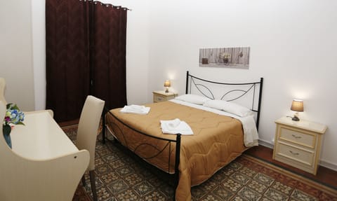 Economy Double Room, Private Bathroom (External) | Desk, free WiFi, bed sheets