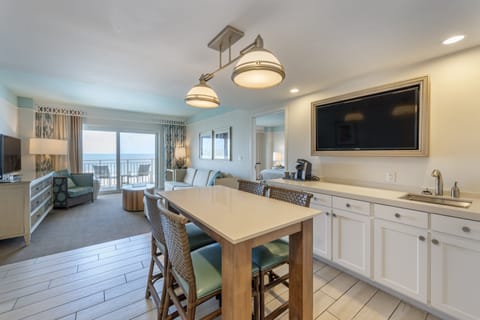 Executive Suite, Ocean View (Pool View) | Living area | 55-inch flat-screen TV with cable channels, TV, foosball