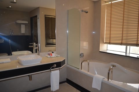 Panoramic Suite, 1 King Bed, Smoking | Bathroom | Shower, free toiletries, hair dryer, bathrobes