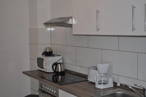 Standard Apartment, 2 Bedrooms, Garden View | Private kitchen | Fridge, microwave, stovetop, coffee/tea maker