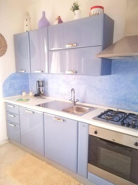 Deluxe Apartment, 2 Bedrooms, Kitchen, Courtyard View | Private kitchen | Full-size fridge, stovetop, coffee/tea maker, electric kettle