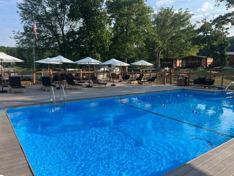 Outdoor pool, open 10:00 AM to 9:00 PM, pool umbrellas, sun loungers