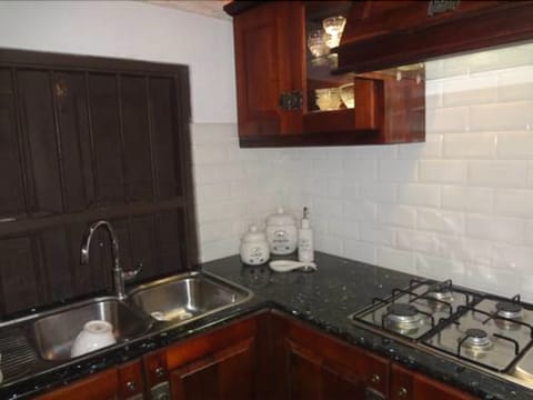 Villa, 5 Bedrooms, Garden View, Garden Area | Private kitchen | Fridge, microwave, oven, stovetop